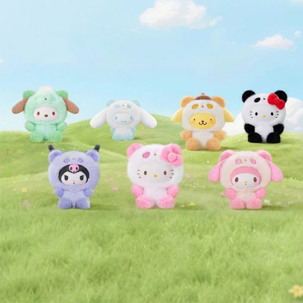 Twinkle Glory Sanrio Hello Kitty and Friends colourful panda plush keychains in a grassy field setting