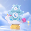 Stacked toy figures with a blue bear, pink heart, and white cloud design on a blue background.