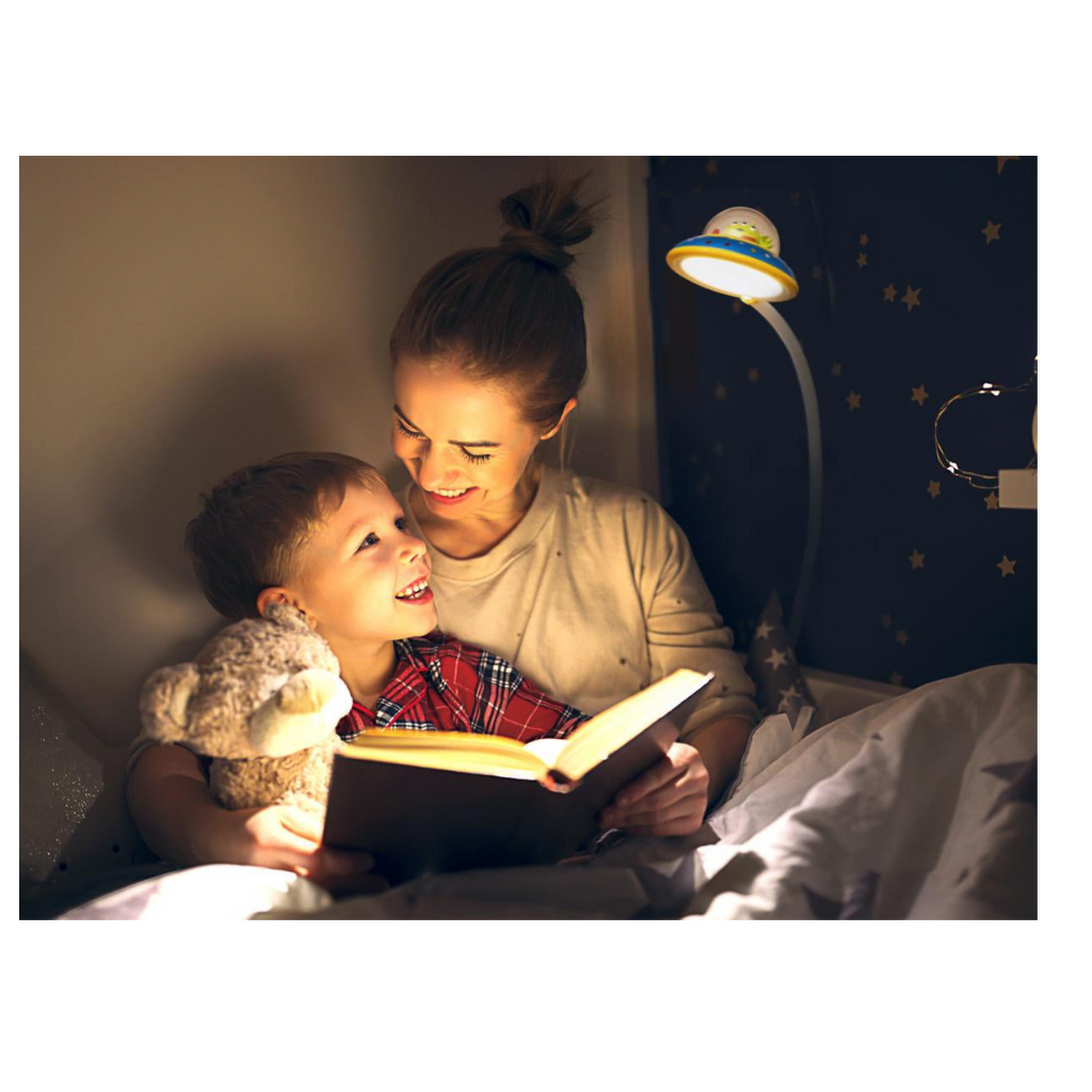 Twinkle Glory Disney Toy Story Alien LED lamp illuminating a mother reading a bedtime story to her young son