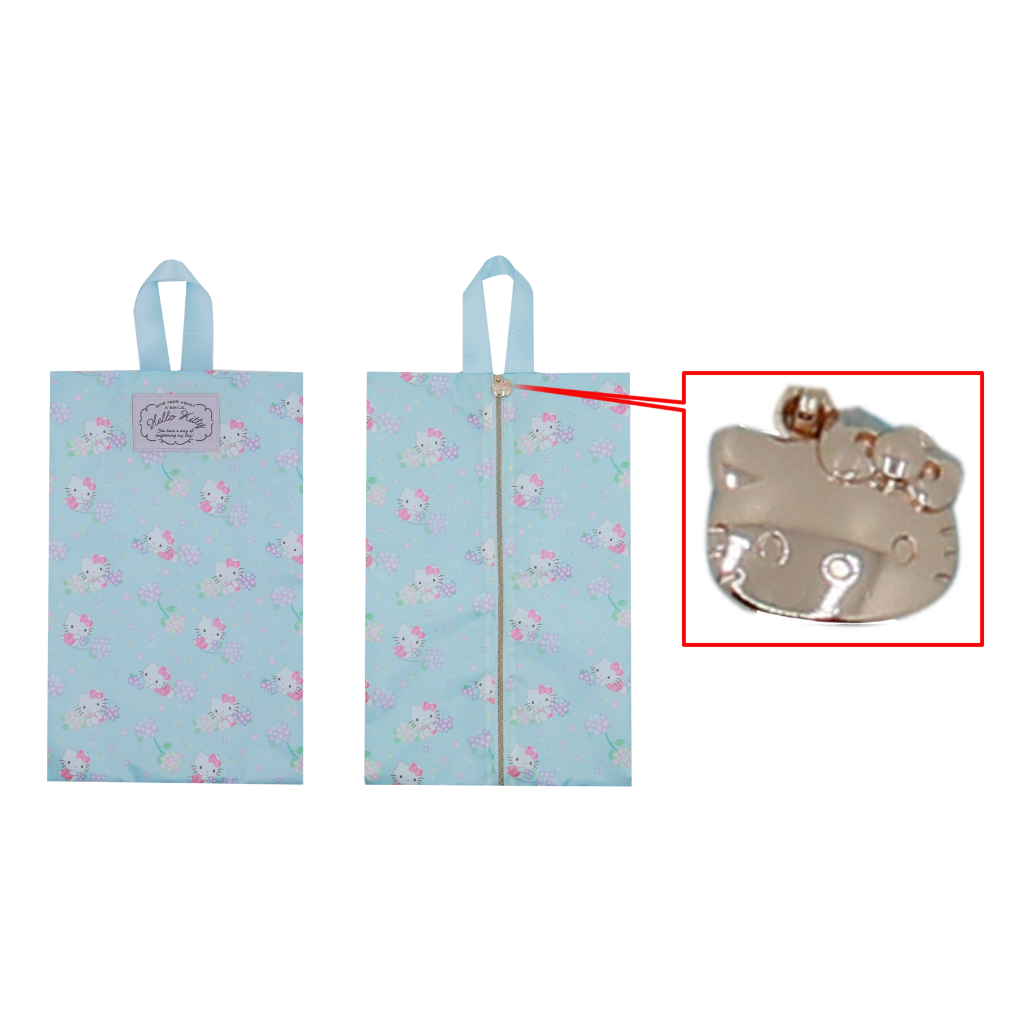 Light blue floral-patterned bag with a close-up of a silver pouch featuring a character design.