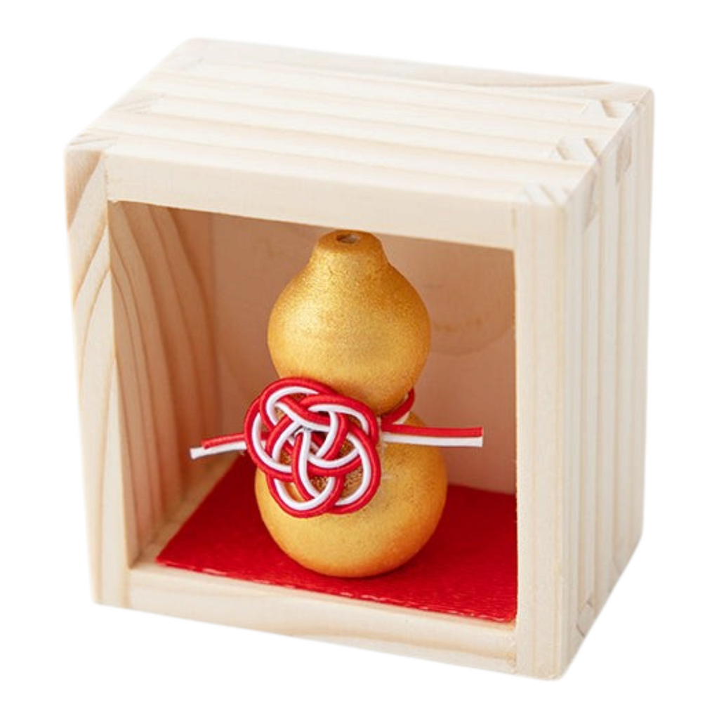 Twinkle Glory gold gourd figurine with red and white decorative knot inside a small wooden box for good luck