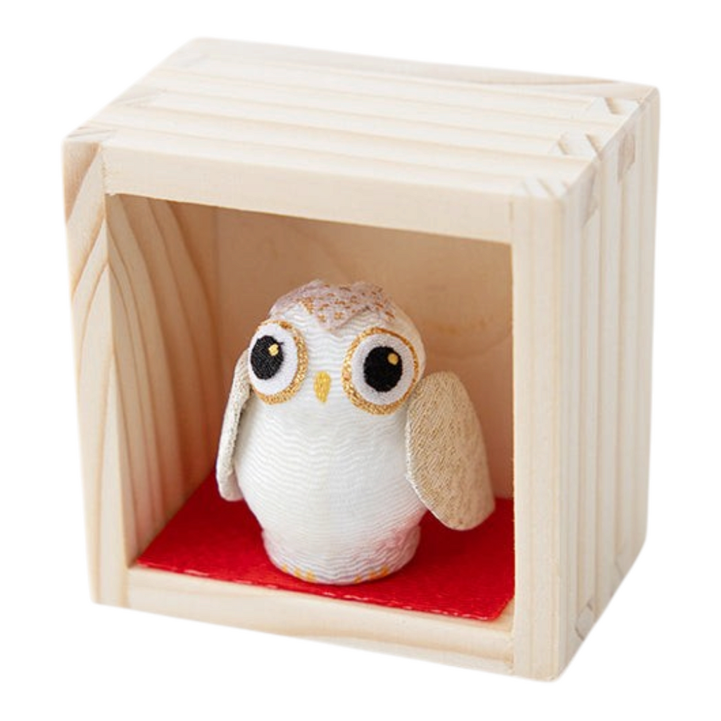 Twinkle Glory white owl figurine inside a small wooden box, a Japanese lucky mascot for good fortune.