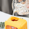 Twinkle Glory house shaped yellow and pink humidifier with cute cartoon character being filled with water
