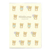 Rilakkuma-themed planner cover with bear illustrations on a light yellow background