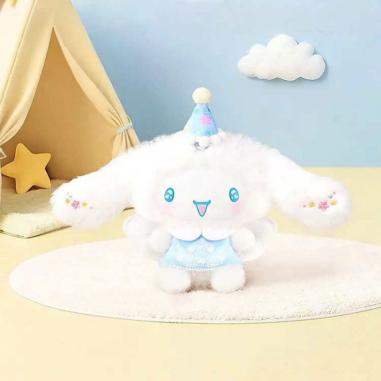 Twinkle Glory Sanrio Cinnamoroll plush bag charm wearing a blue party hat and dress with soft white fur and wings