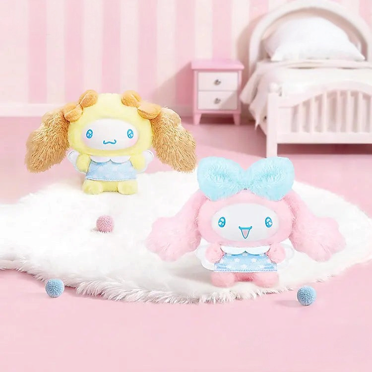 Twinkle Glory Sanrio Cinnamoroll Sweets Friends fluffy plush bag charms featuring pastel yellow and pink designs.