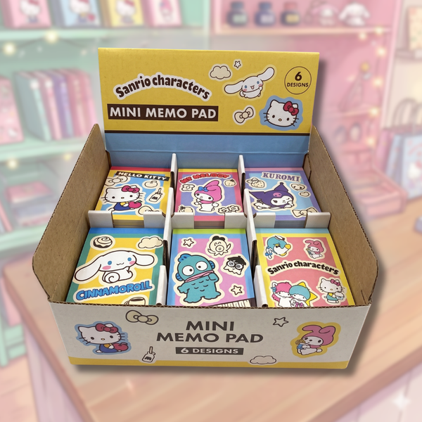 Box of Sanrio character mini memo pads with colorful designs.