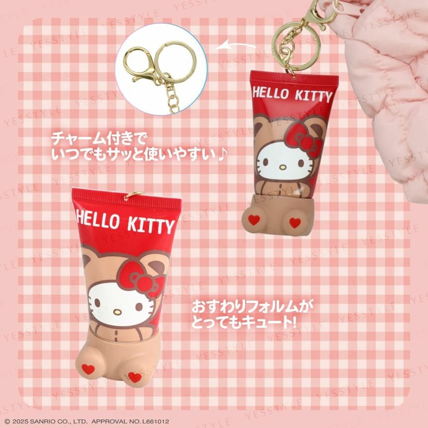 Hello Kitty-themed product with keychain on a pink checkered background
