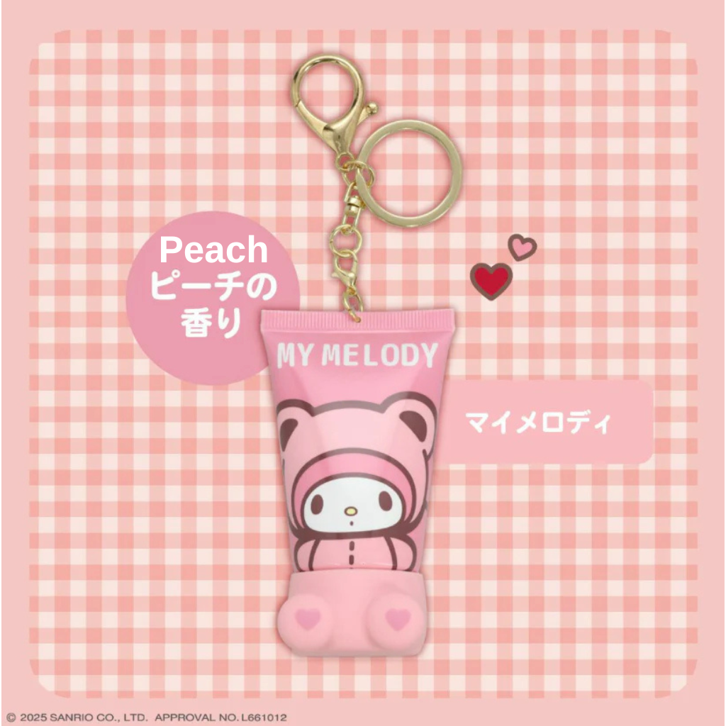 Pink keychain with cartoon character on a pink checkered background