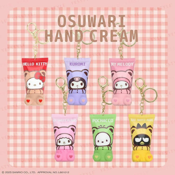 Set of cartoon-themed hand cream keychains on a pink checkered background