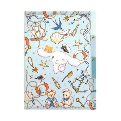 A light blue notebook or planner cover decorated with a whimsical nautical and teddy bear theme, featuring illustrations of bears, anchors, seashells, stars, and a sailing ship.