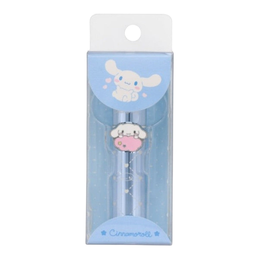 A Cinnamoroll-themed pen in its original retail packaging. The pen features a light blue body with a small, detailed Cinnamoroll character charm on the front.