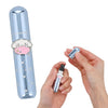 A small cylindrical perfume or fragrance bottle with a metallic silver cap and a black spray nozzle, shown with a matching decorative cloud-shaped cap being held by two hands. The bottle has a pale blue reflective finish with a heart and cloud design and the text 'Cotton Candy' visible on the side.