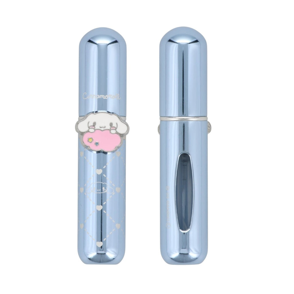 A light blue metallic lip gloss tube shown in two views: one closed with a cute character charm in the center, and one open showing the applicator window.
