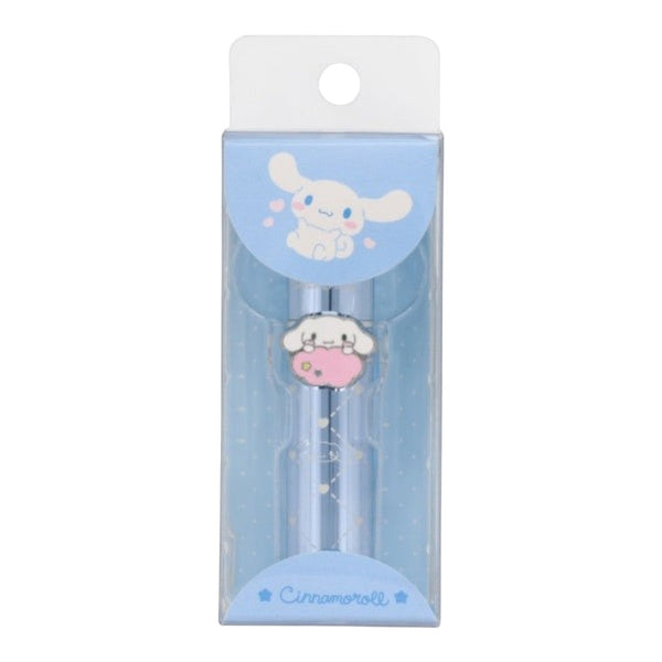 A Cinnamoroll-themed pen in its original retail packaging. The pen features a light blue body with a small, detailed Cinnamoroll character charm on the front.