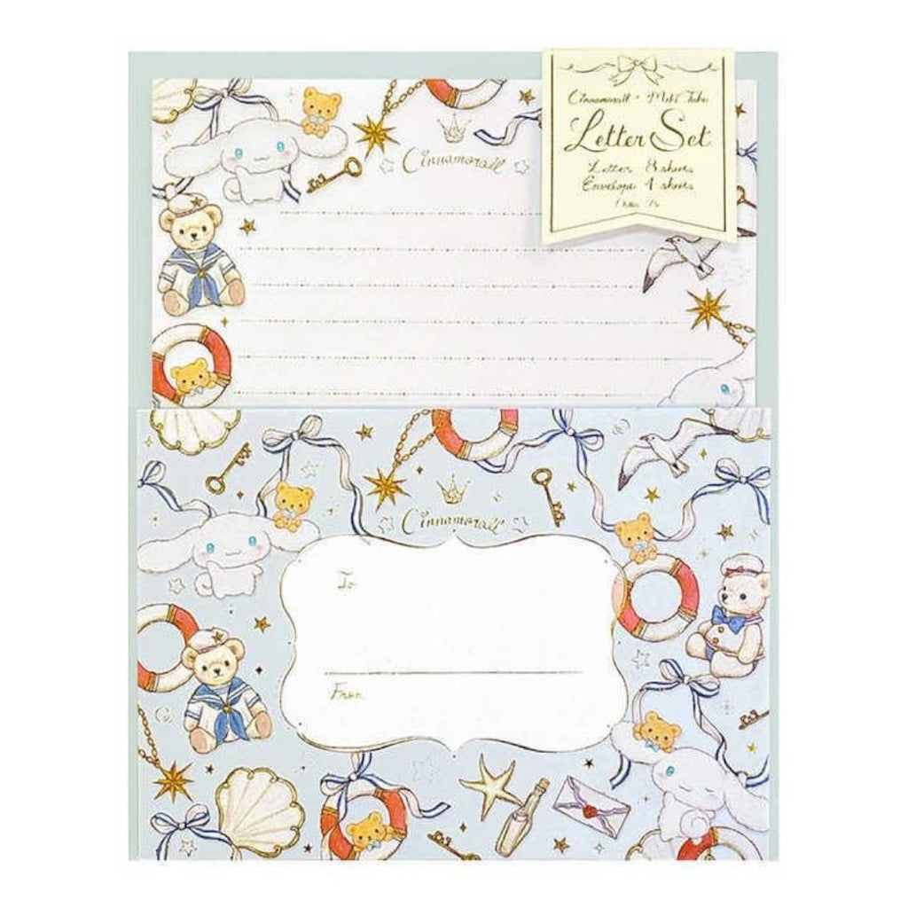 A commemorative letter set with a light blue envelope decorated with teddy bears, sea life illustrations, and gold stars, paired with lined white letter paper.
