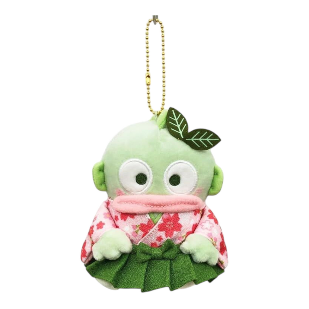 A green plush character keychain or bag charm with a gold ball chain, wearing a pink floral kimono and green leaf accessories, shown on a plain white background.