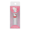 A Hello Kitty toothbrush in its original retail packaging, featuring a white toothbrush with a red bow and Hello Kitty charm, inside a pink and clear plastic box with a white hanger tab.
