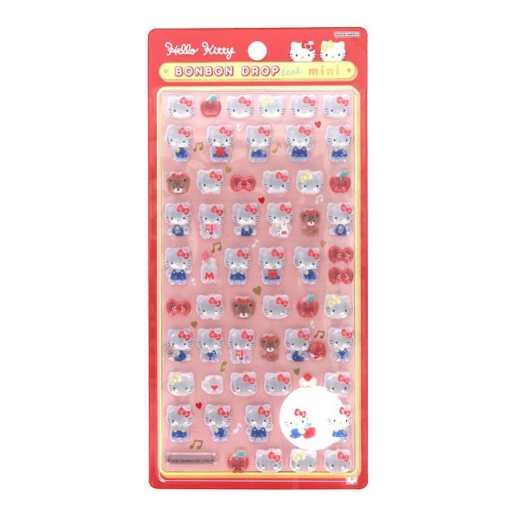 Hello Kitty Bonbon Drop mini stickers in a red blister pack, featuring various small Hello Kitty character stickers on a pink background.
