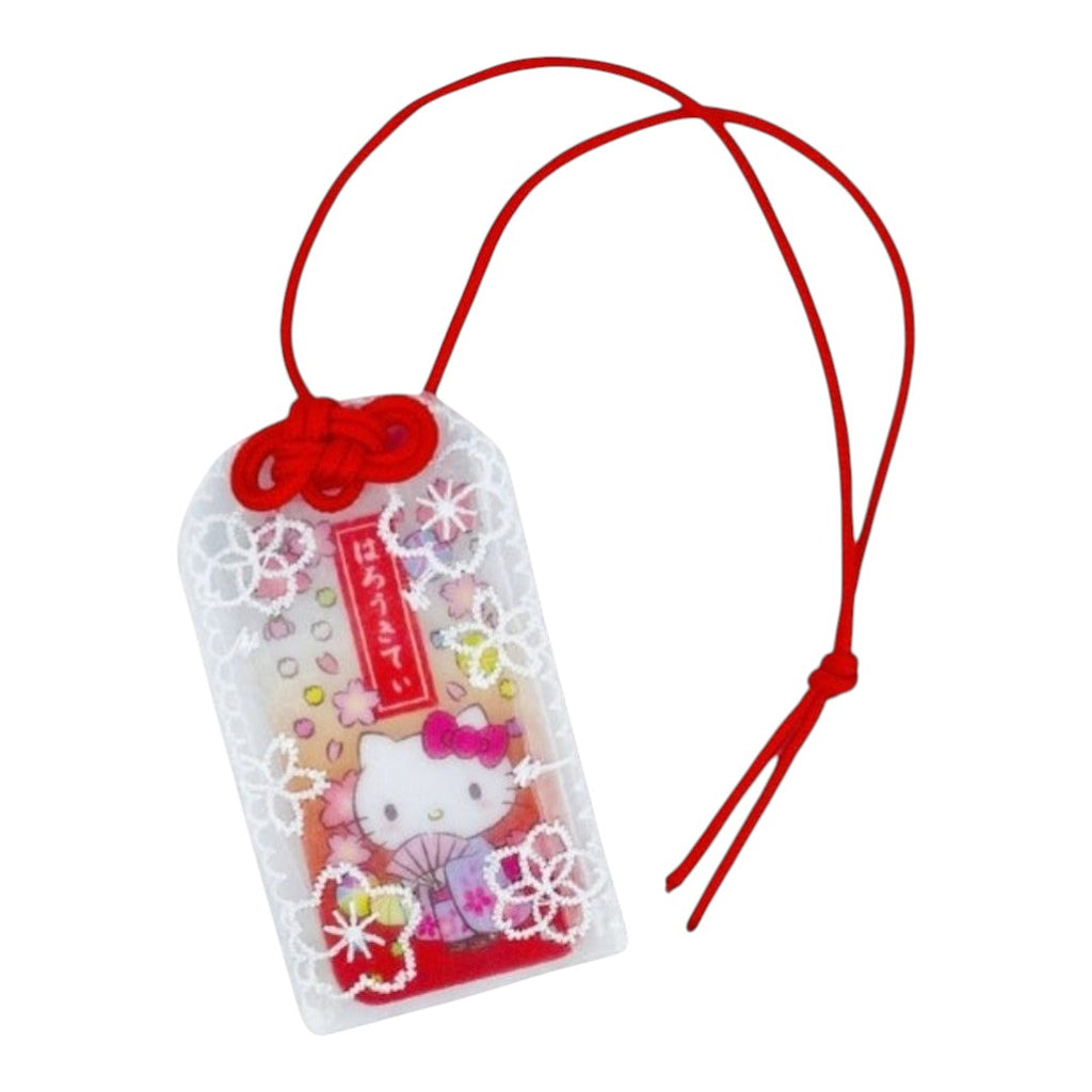 Hello Kitty phone charm with red bow and string on a white background