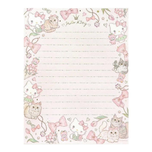 A Hello Kitty lined notepad with a cute pastel border featuring Hello Kitty, cats, bows, flowers, and hearts on a white background.