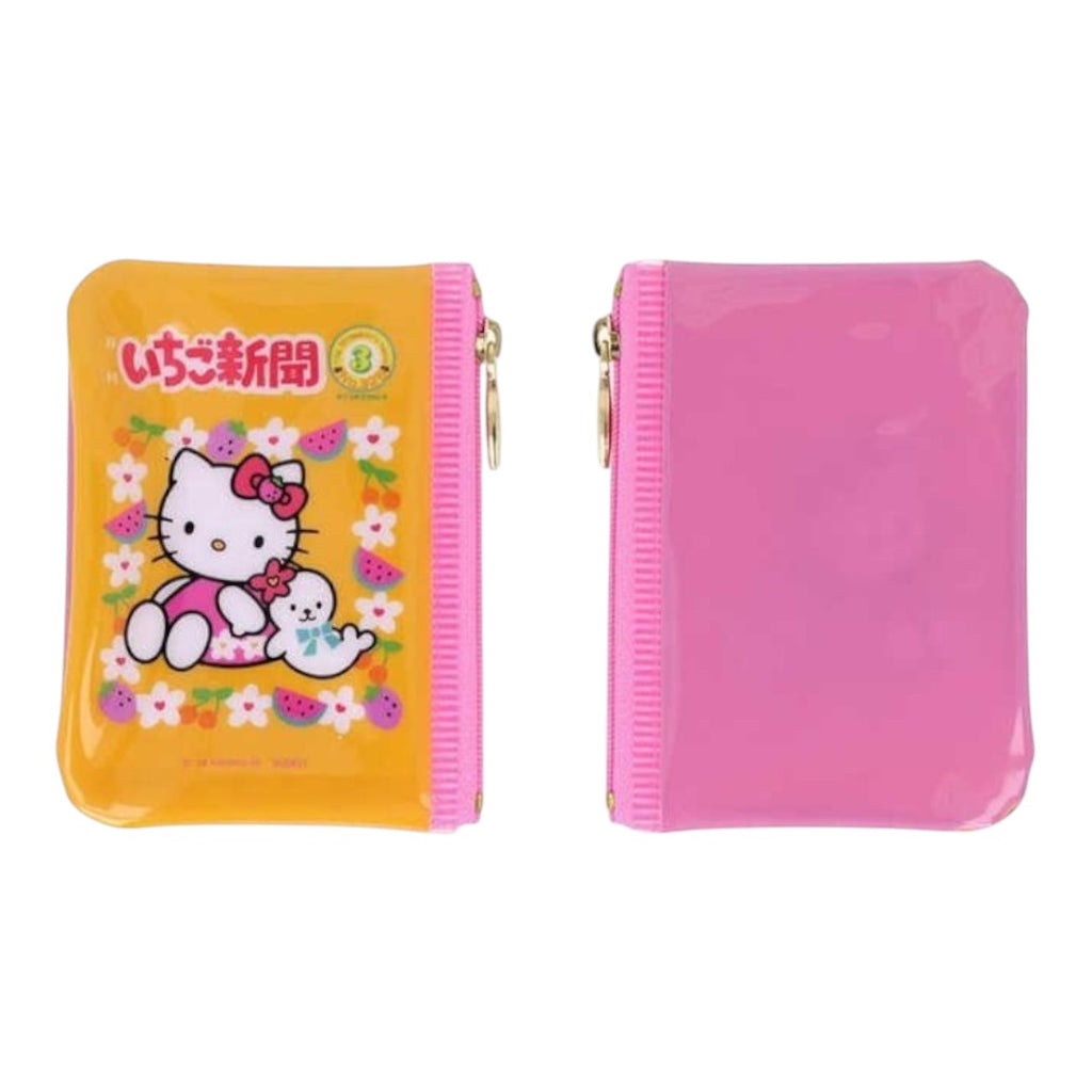 Two pink zippered Hello Kitty coin purses shown side by side on a white background. The left purse has a yellow-orange front with a Hello Kitty illustration and Japanese text, and the right purse is plain pink with a glossy finish.