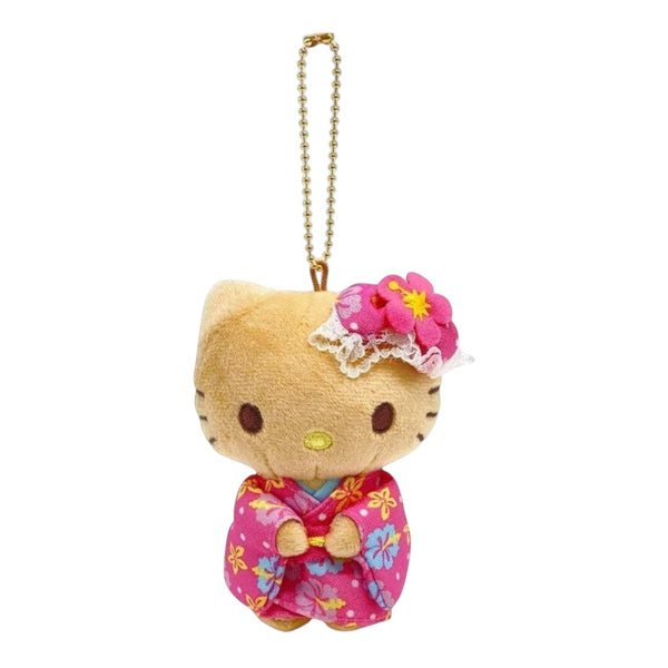 A Hello Kitty plush keychain charm in a pink floral kimono with a pink flower headband, attached to a gold ball chain, on a plain white background.