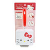Hello Kitty hand-held cleaning brush in retail packaging, with a red handle and a white brush head printed with Hello Kitty's face and bow, on a plain white background.