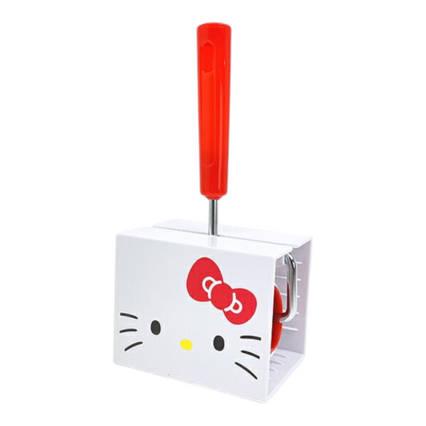 A Hello Kitty branded kitchen tool, likely a cheese grater or food processor, featuring a white body with the Hello Kitty face and red bow, a red handle, and a silver metal rod.