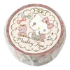 A roll of decorative masking tape in a clear plastic sleeve, featuring a round label with an illustration of Hello Kitty, a teddy bear, bows, and the text 'Ludo Nino x MiTiTaKa Masking Tape'.