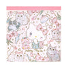 A square Hello Kitty x Mini Tulip collaboration paper napkin featuring a pastel pink and white design with illustrations of cats, bows, flowers, and a teddy bear.