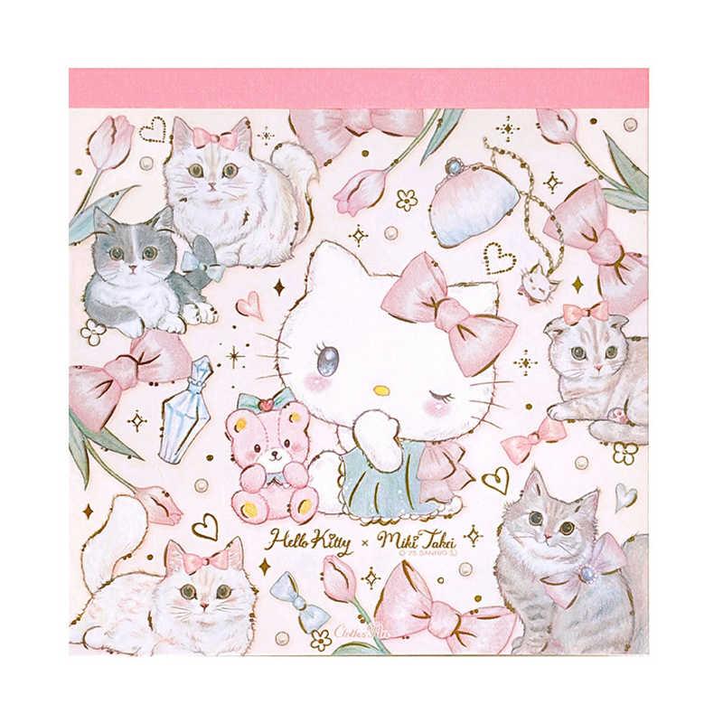 A square Hello Kitty x Mini Tulip collaboration paper napkin featuring a pastel pink and white design with illustrations of cats, bows, flowers, and a teddy bear.
