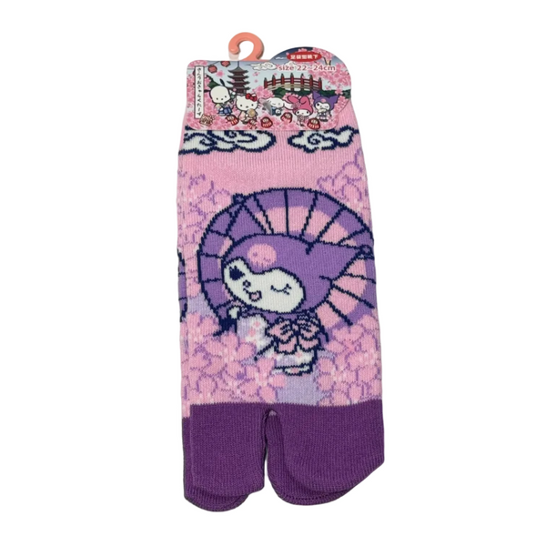 Purple sock with cartoon character on a pink floral background, displayed on a white background.