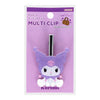 A Sanrio Kuromi multi-clip accessory in its original packaging. The clip features a purple glittery Kuromi character design with white accents and a silver metal clip mechanism, mounted on a lavender card labeled 'MULTI CLIP' with 'sanrio' branding.