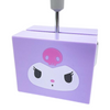 A purple plastic desk organizer featuring a cartoon face with a pink skull on the front, with a metal stand inserted at the top, shown against a plain white background.