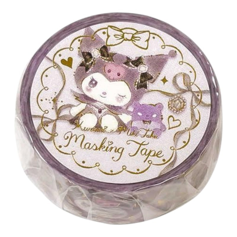 A round roll of Kuromi-themed masking tape in its clear plastic packaging, featuring a purple and white cartoon design with gold glitter accents.