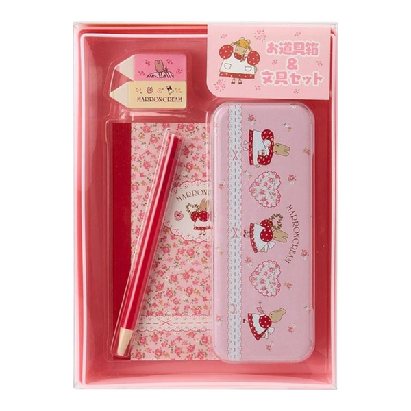 A Maddoon Cream pencil set in a clear plastic gift box, featuring a pink floral notebook, a red pencil, a pink eraser, and a pink pencil case with cute character illustrations.