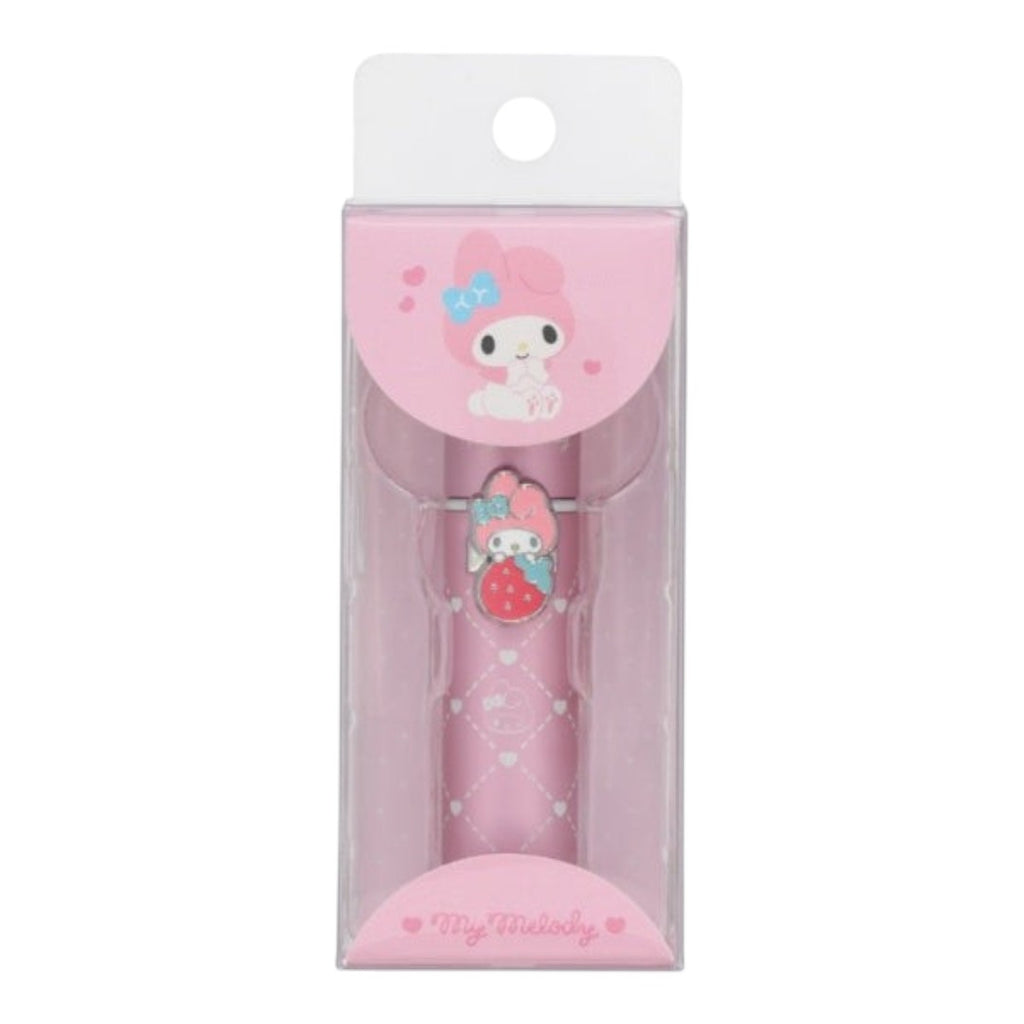 A pink My Melody branded pen or accessory inside a clear plastic blister pack with a white cardboard hanger tab. The packaging features a pink My Melody illustration, and the pen itself has a strawberry-themed charm.