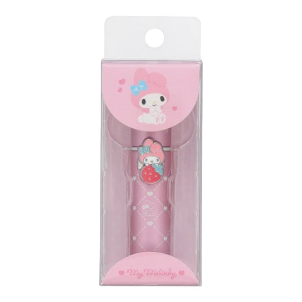 A pink My Melody branded pen or accessory inside a clear plastic blister pack with a white cardboard hanger tab. The packaging features a pink My Melody illustration, and the pen itself has a strawberry-themed charm.
