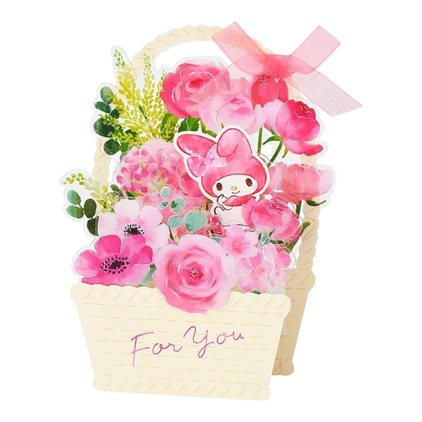 A pink floral gift basket card featuring watercolor-style flowers, a My Melody character sticker, a pink ribbon bow, and a cream-colored basket base with the words 'For You' written on it, shown on a plain white background.