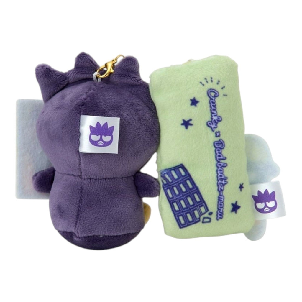 Twinkle Glory Sanrio Bad Badtz-Maru plush keychain with a soft purple character and a light green chocolate accessory.