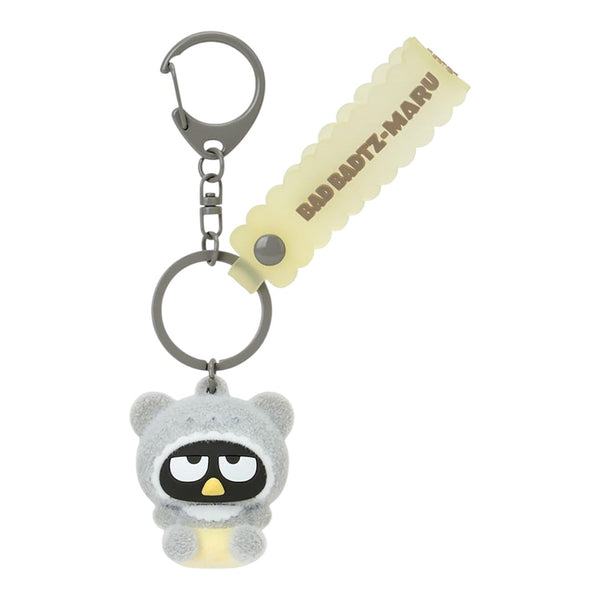Twinkle Glory Sanrio Badtz Maru flocked resin mascot keychain with a yellow decorative strap and metal keyring.