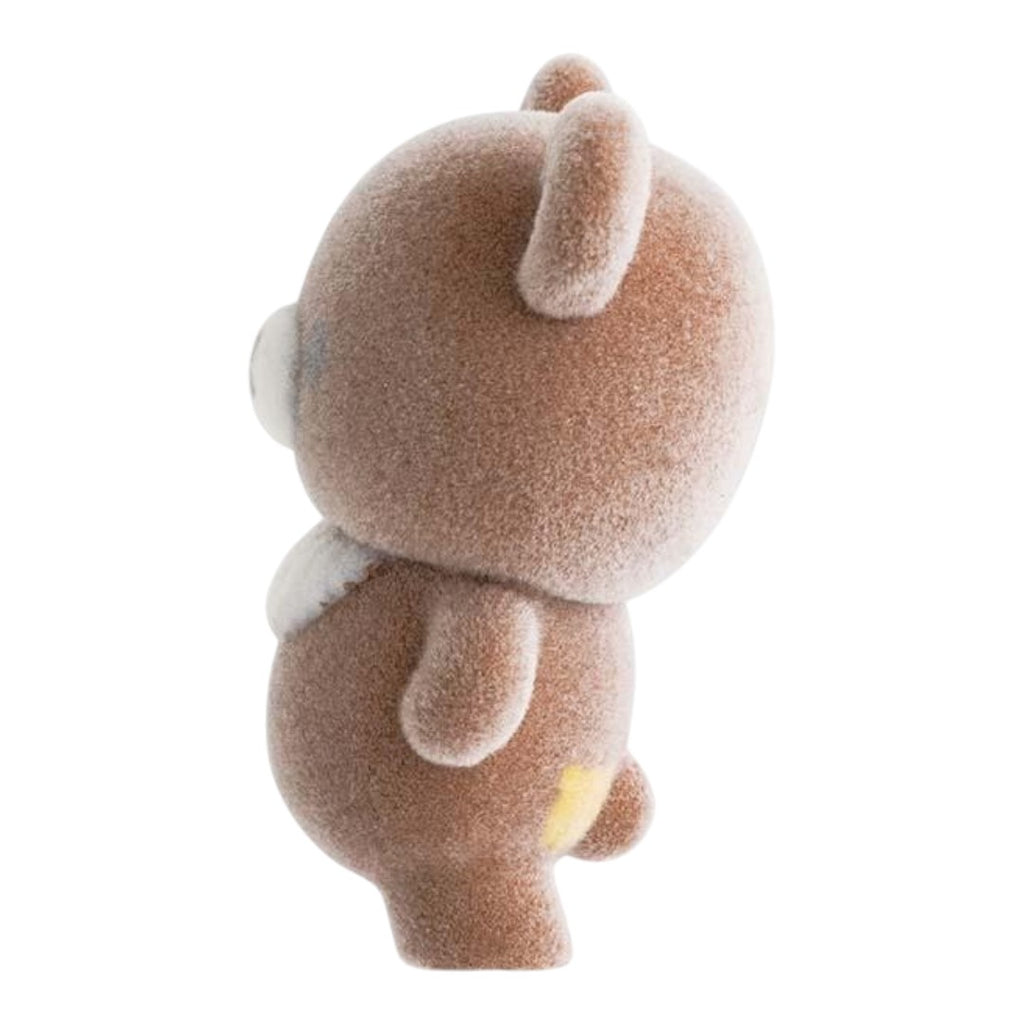 Twinkle Glory San-X Chairoikoguma flocked figure in a side view, showing the soft brown velvety texture
