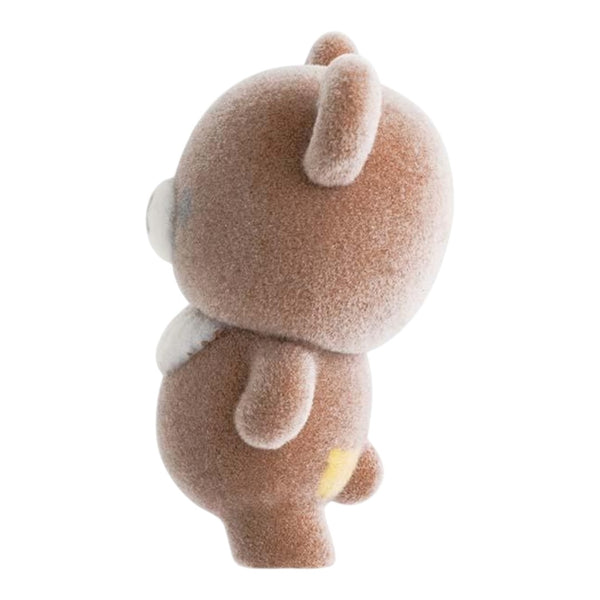 Twinkle Glory San-X Chairoikoguma flocked figure in a side view, showing the soft brown velvety texture