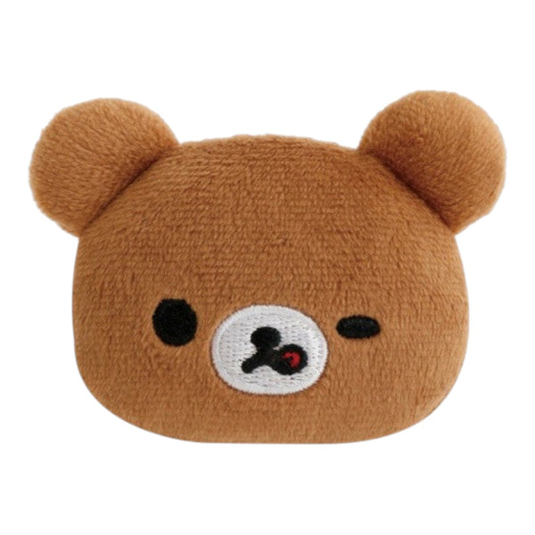 Twinkle Glory San-X Chairoikoguma plush badge featuring a brown bear with a wink and lick expression