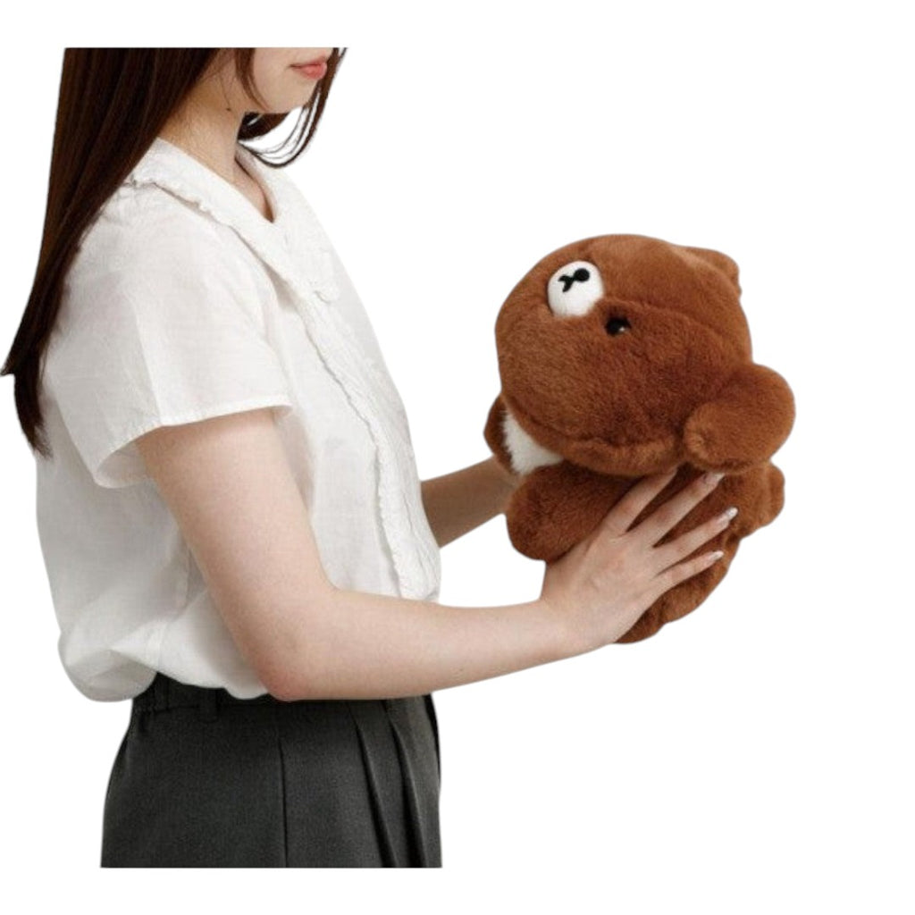 Twinkle Glory San-X Chairoikoguma brown polyester plush toy being held by a person
