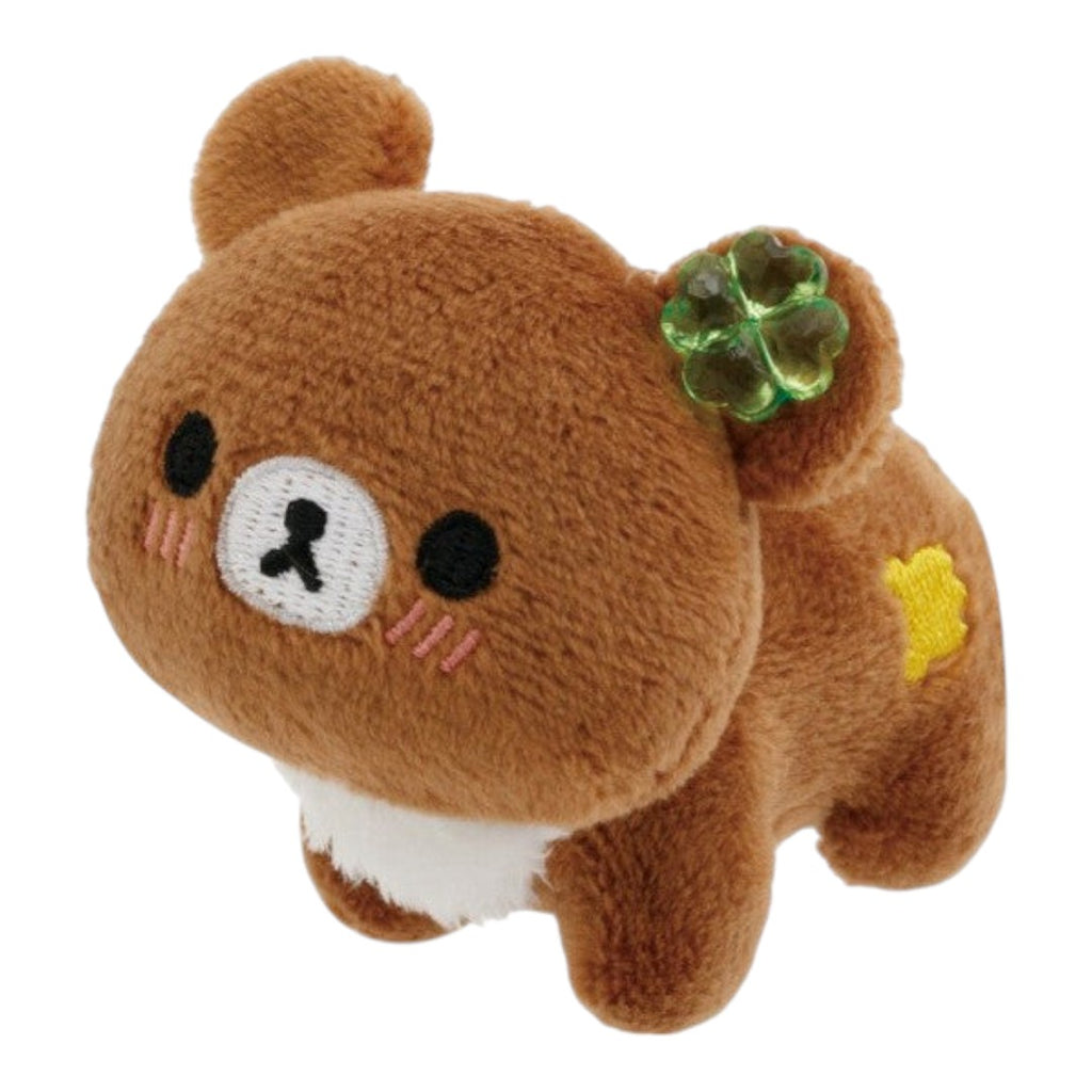 Twinkle Glory San-X Rilakkuma Chairoikoguma palm-sized plush with a green clover accessory and soft brown fur