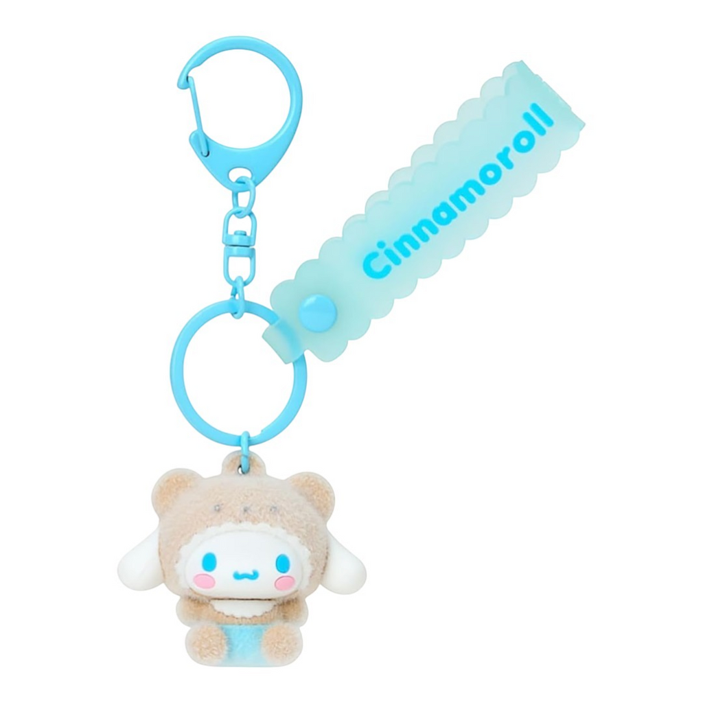 Twinkle Glory Sanrio Cinnamoroll flocked resin mascot keychain with a blue silicone strap on a white background