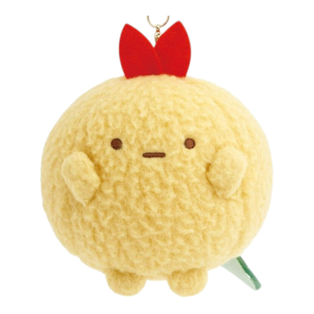 Twinkle Glory San-X Sumikko Gurashi Ebifurai no Shippo round plush keychain with a red bow and soft yellow texture