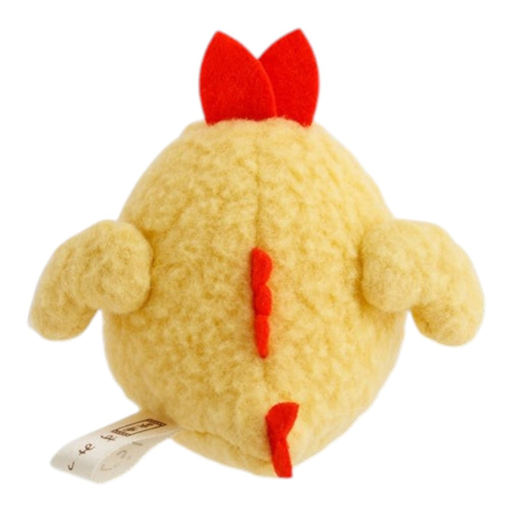 Twinkle Glory San-X Sumikko Gurashi Ebifurai no Shippo plush toy with red felt details on a yellow textured body